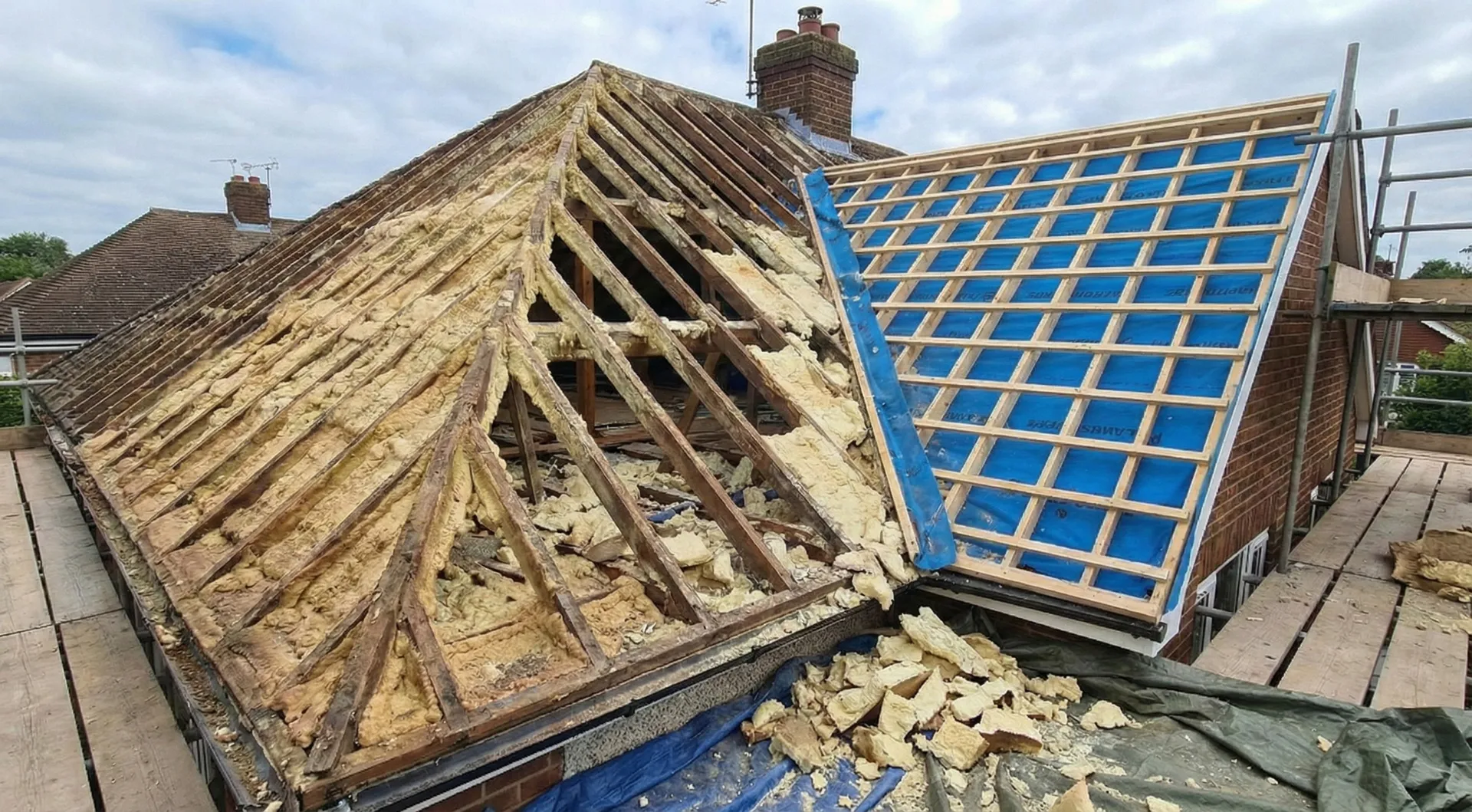 Spray foam insulation removal from roof space before re-roofing